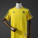 חולצת Terrace Icons אל נאסר צבע צהוב