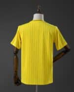 חולצת Terrace Icons אל נאסר צבע צהוב