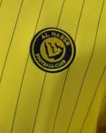 חולצת Terrace Icons אל נאסר צבע צהוב