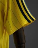 חולצת Terrace Icons אל נאסר צבע צהוב