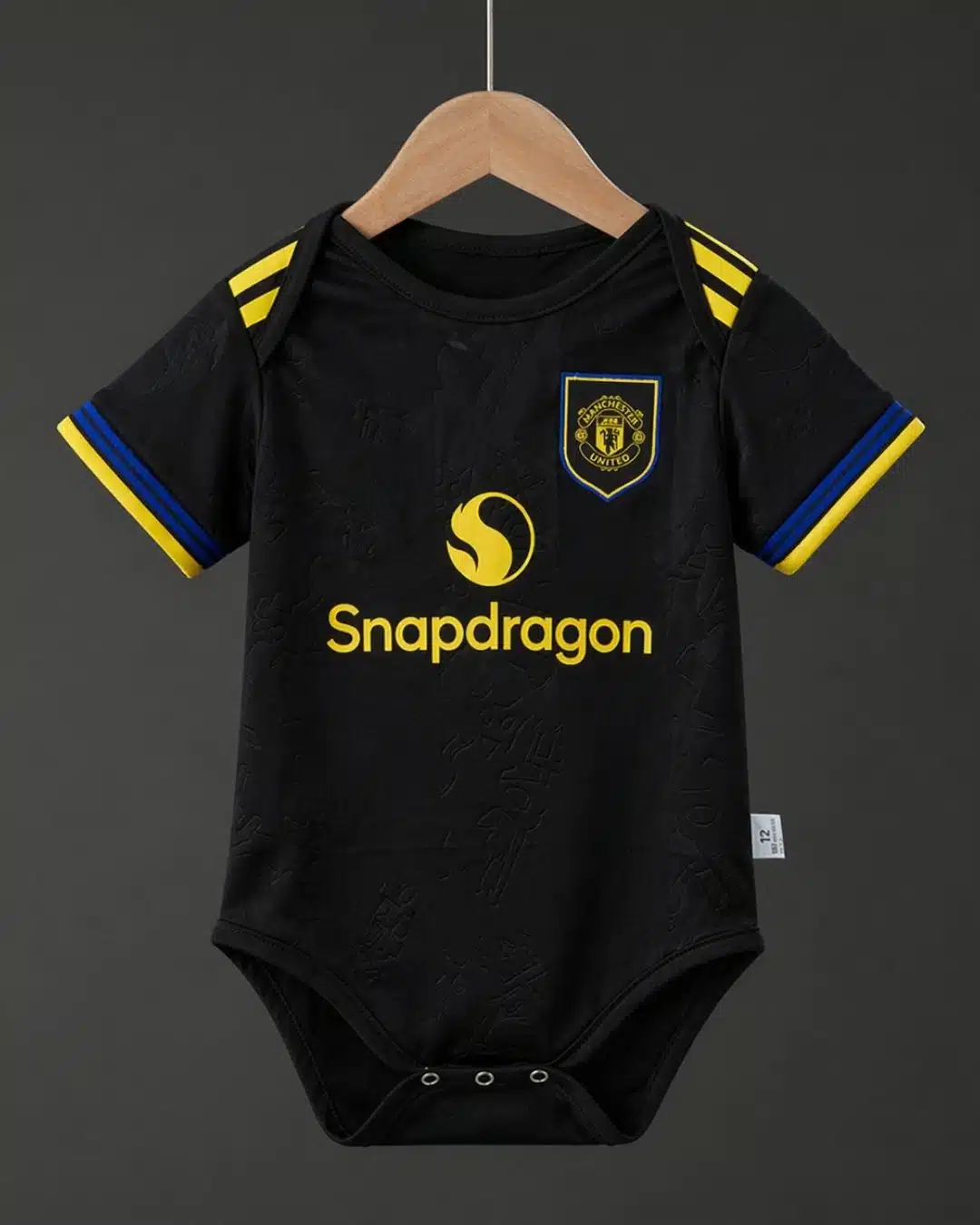 בגד גוף לבייבי מדים שלישיים מנצ'סטר יונייטד עונת 2025/2026