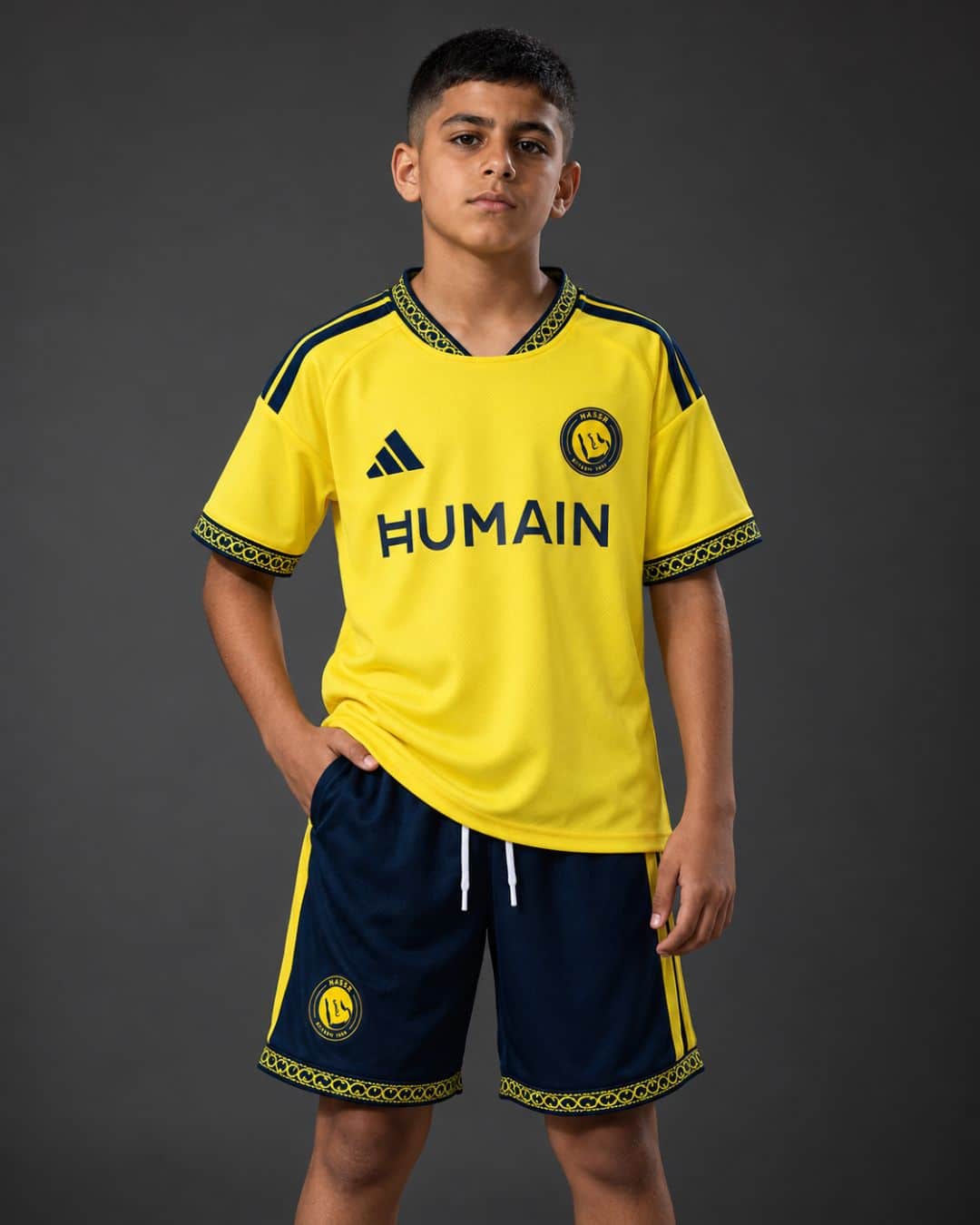 Al-Nassr-Home-26_27-Kids-model סט ילדים מדי בית אל נאסר עונת 2026/2027