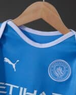 בגד גוף לבייבי מדי בית מנצ'סטר סיטי עונת 2026/2027